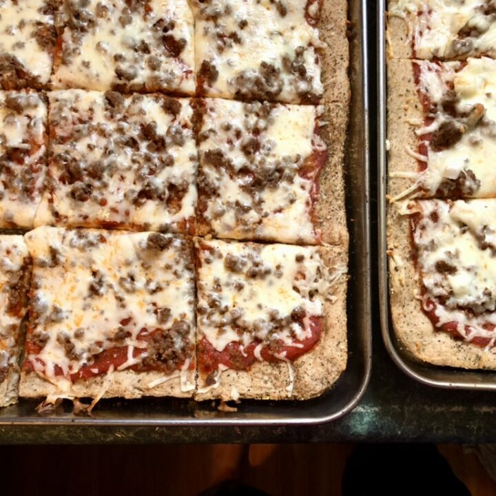 close up of finished and cut pizza