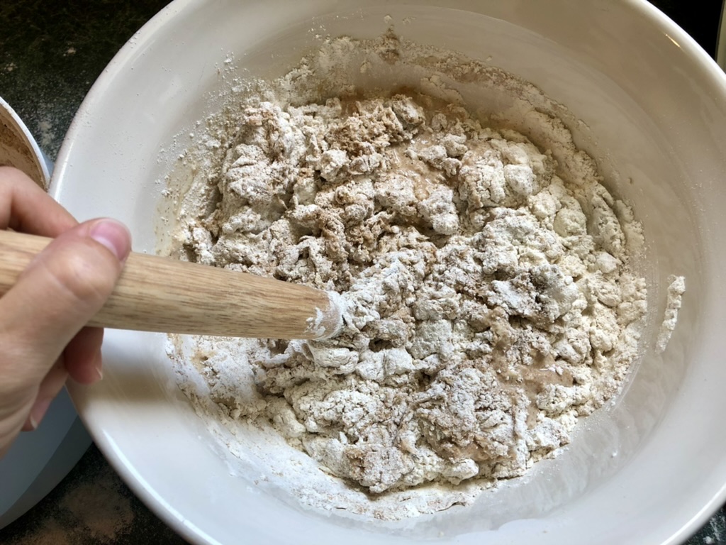 stirring pizza dough